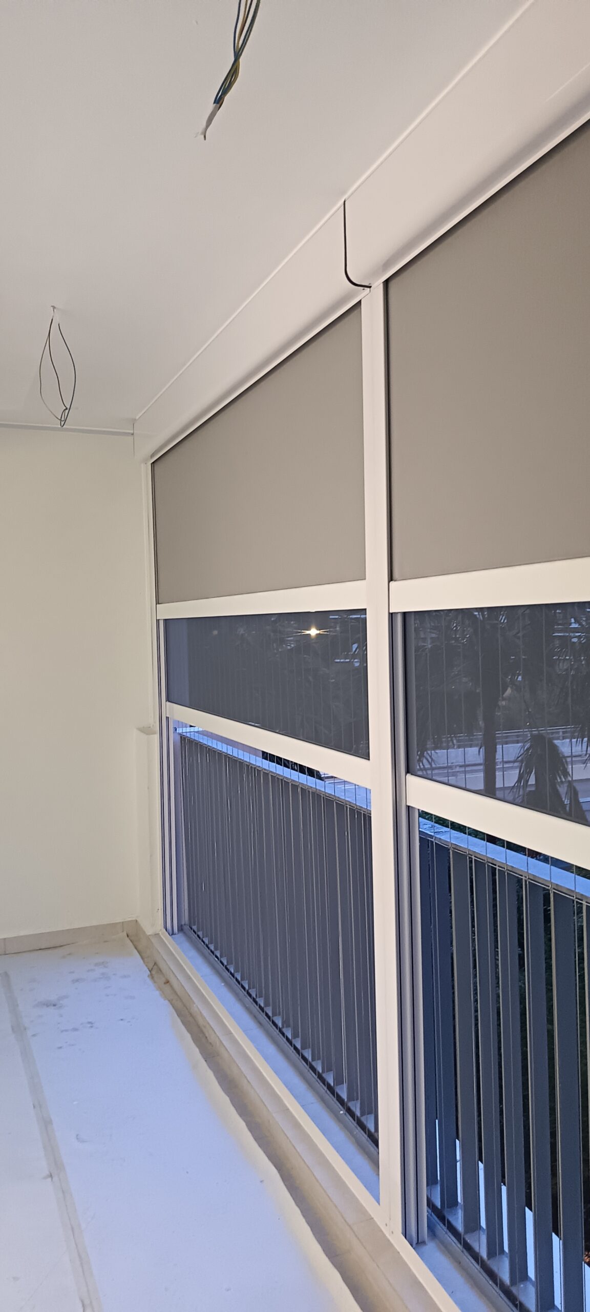 Modern balcony zip blind installation