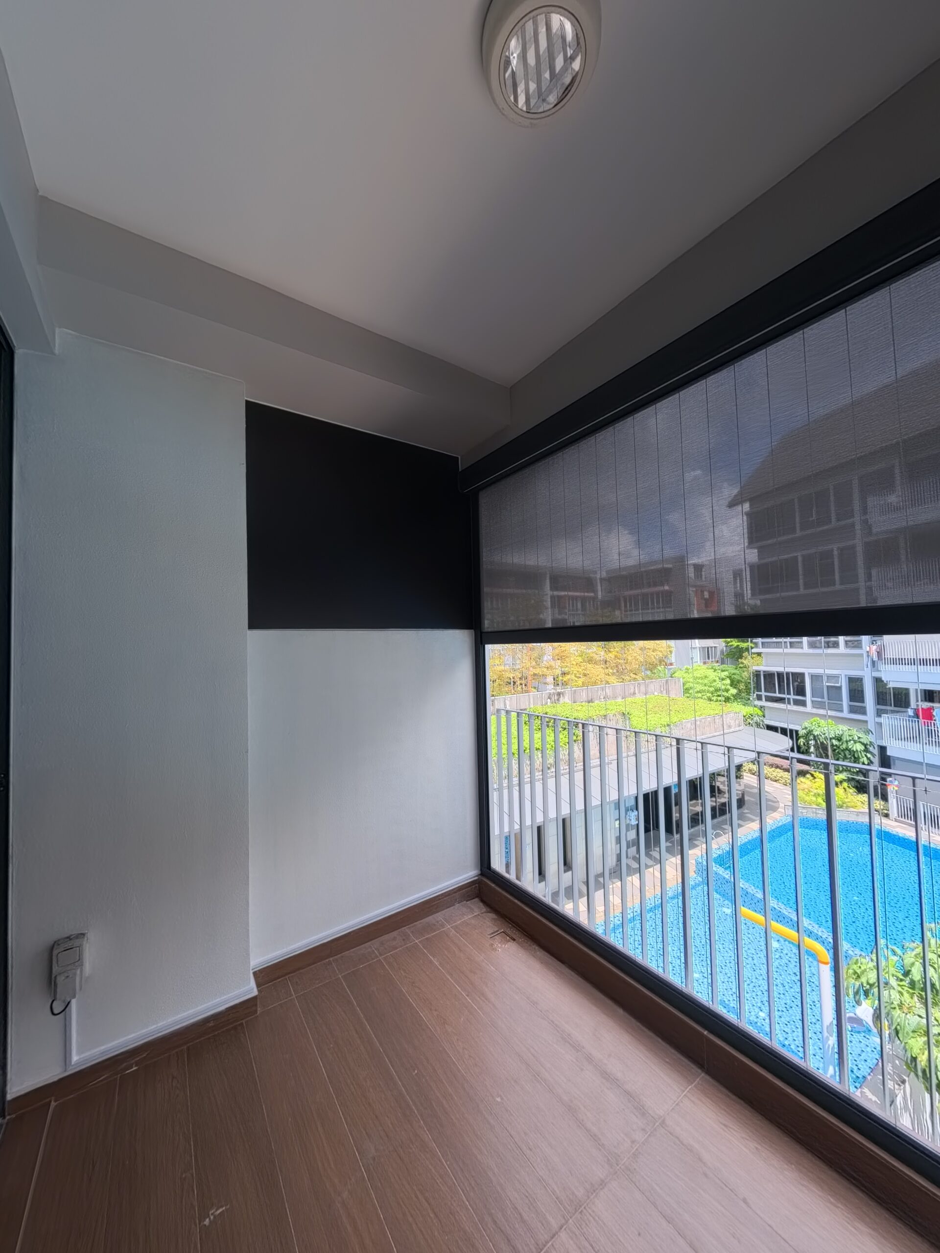 Titanshade zip blind installation for Singapore balcony